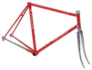 A Colnago bicycle frame and fork set, with Campagnolo Athena headset, shaped lugs, red with...