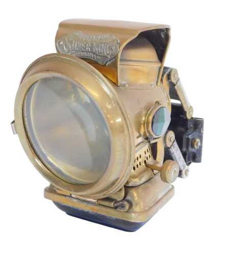 A Joseph Lucas Ltd Birmingham Silver King brass cased bicycle lamp, with two faceted glass inset...