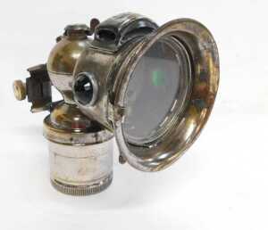 A Miller Bola carbide/acetylene bicycle lamp, each side inset with a faceted red and green glass... - 4