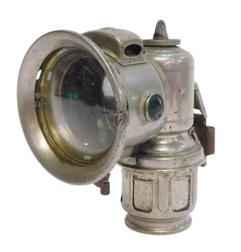 A Lucas Galcia Major carbide/acetylene bicycle lamp, set with faceted red and green glass...