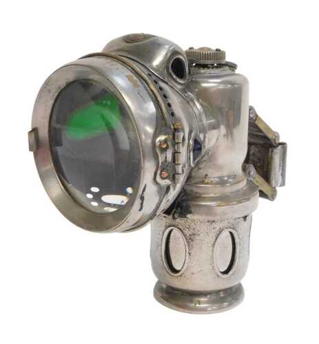 A Powell and Hanmer Birmingham carbide/acetylene bicycle lamp, inset with faceted red and green...