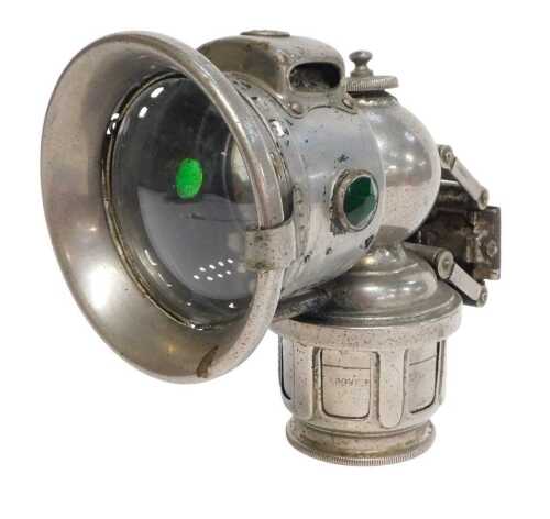 A Joseph Lucas Ltd Birmingham carbide/acetylene bicycle lamp, inset with faceted red and green...