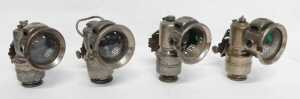 Four Powell and Hanmer Ltd Birmingham carbide/acetylene bicycle lamps, each inset with red and... - 3