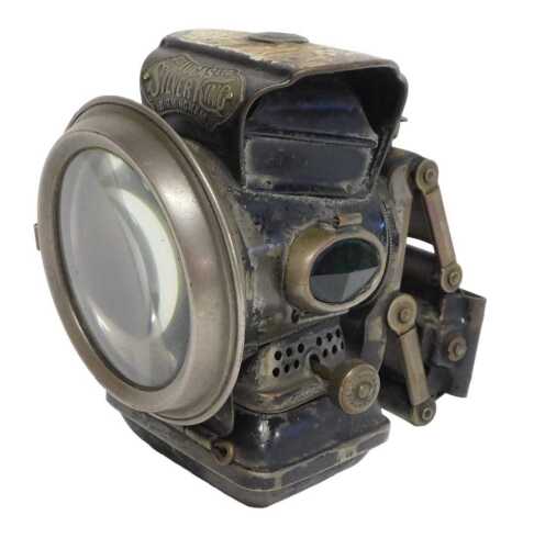 A Joseph Lucas Ltd Birmingham Super King paraffin bicycle lamp, painted black, with a marbled...