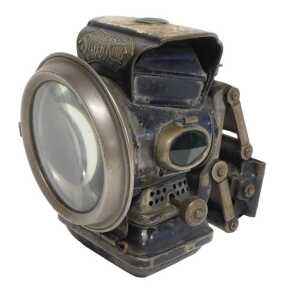 A Joseph Lucas Ltd Birmingham Super King paraffin bicycle lamp, painted black, with a marbled...