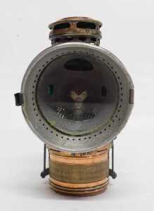 A Twentieth Century American copper and brass carbide/acetylene bicycle lamp, inset with green... - 3