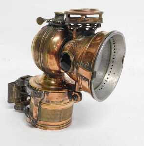 A Twentieth Century American copper and brass carbide/acetylene bicycle lamp, inset with green... - 4