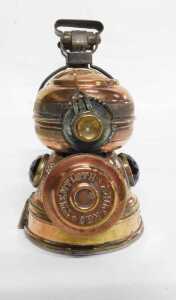 A Twentieth Century American copper and brass carbide/acetylene bicycle lamp, inset with green... - 5