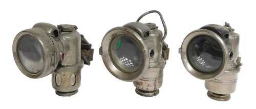 Three Powell and Hanmer carbide paraffin lamps, one titled Chieftain, 16cm high, and another The...