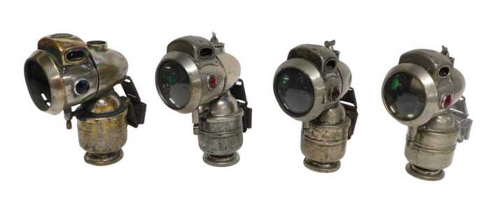 Four Powell and Hanmer Ltd Birmingham Vulture carbide/acetylene bicycle lamps, each inset with...