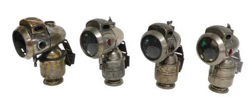 Four Powell and Hanmer Ltd Birmingham Vulture carbide/acetylene bicycle lamps, each inset with...
