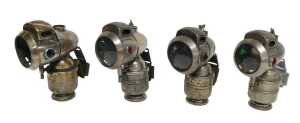 Four Powell and Hanmer Ltd Birmingham Vulture carbide/acetylene bicycle lamps, each inset with...