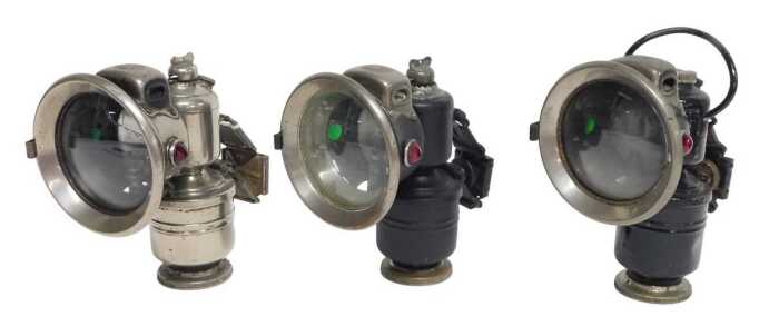 Three Powell and Hanmer Ltd Birmingham carbide/acetylene bicycle lamps, two painted black, each...