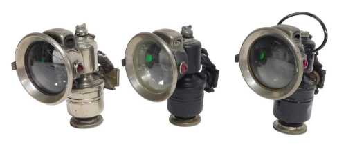 Three Powell and Hanmer Ltd Birmingham carbide/acetylene bicycle lamps, two painted black, each...