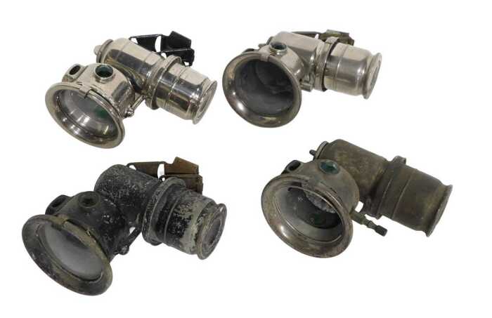 Four Joseph Lucas Ltd Birmingham Calcia Cadet carbide/acetylene bicycle lamps, each inset with...