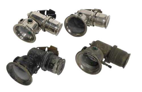 Four Joseph Lucas Ltd Birmingham Calcia Cadet carbide/acetylene bicycle lamps, each inset with...