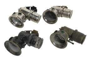 Four Joseph Lucas Ltd Birmingham Calcia Cadet carbide/acetylene bicycle lamps, each inset with...