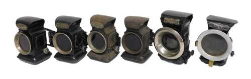 Four Joseph Lucas Ltd Birmingham Warna paraffin bicycle lamps, 11cm high, together with two For...