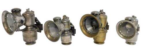 Four Joseph Lucas Ltd Birmingham Aceta carbide/acetylene car lamps, two No. 316, 14cm high, and...