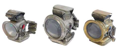 Three paraffin bicycle lamps, for Joseph Lucas Ltd Birmingham Holophote, Parker's Lamp...