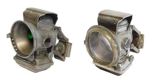 Two Joseph Lucas Ltd Birmingham Silver King paraffin bicycle lamps, each inset with coloured...