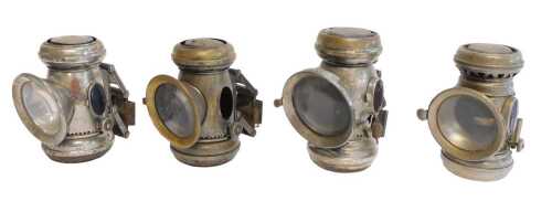 Four paraffin bicycle lamps, two for Joseph Lucas Ltd Birmingham Captain No 320 lamps, 12cm high,...