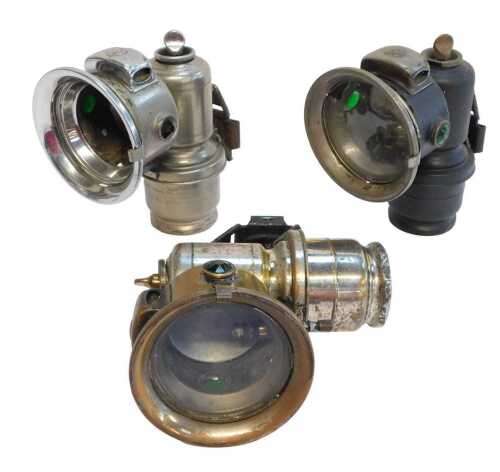 Three Joseph Lucas Ltd Birmingham Calcia Club carbide/acetylene bicycle lamps, each inset with...