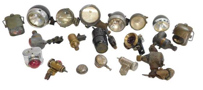 A group of bicycle-related items, to include Miller lamps, a No. 1215 rear lamp, further rear...