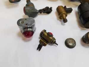 A group of bicycle-related items, to include Miller lamps, a No. 1215 rear lamp, further rear... - 6