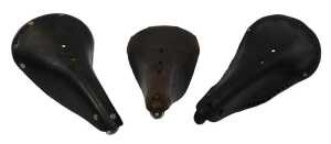 A Norex 38 leather saddle, with copper and brass rivets, an Ideal 80 leather saddle, and a...