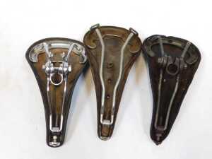 A Norex 38 leather saddle, with copper and brass rivets, an Ideal 80 leather saddle, and a... - 4