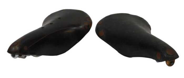A Brooks B17 leather saddle, Champion narrow, and a Brooks Professional leather saddle with...