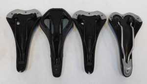 A small group of saddles, comprising a CB E4P saddle, two Selle Italia XO saddles and a Selle... - 5