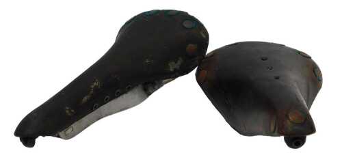 A Brooks Professional Select saddle, with copper rivets, and a Mansfield leather saddle, with...