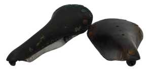 A Brooks Professional Select saddle, with copper rivets, and a Mansfield leather saddle, with...