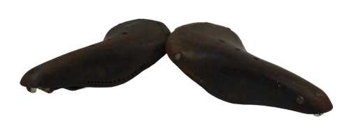 A Brooks B17 Champion narrow leather saddle, and another Brooks saddle. (2)