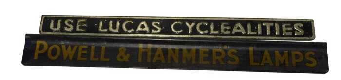 A Powell & Hanmers Lamps advertising sign, and a Use Lucas Cyclealities advertising sign. (2)