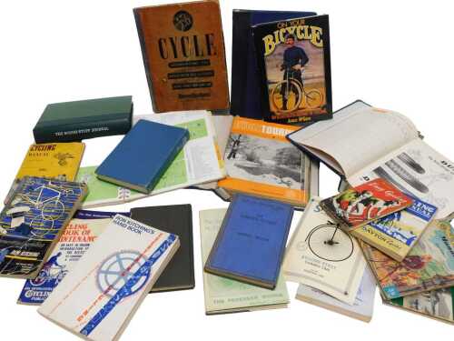 Cycling-related books, including The Corgi Book of Bicycles and Bicycling, Cycling Manual 23rd...
