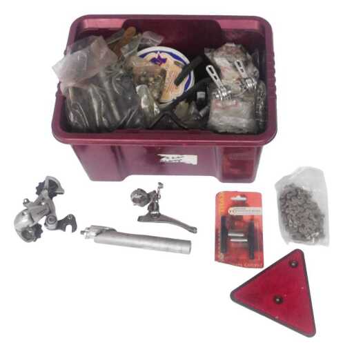 Various bicycle parts, including chains, Shimano Sora derailleur, Sun Tour gear levers, Sun Tour...