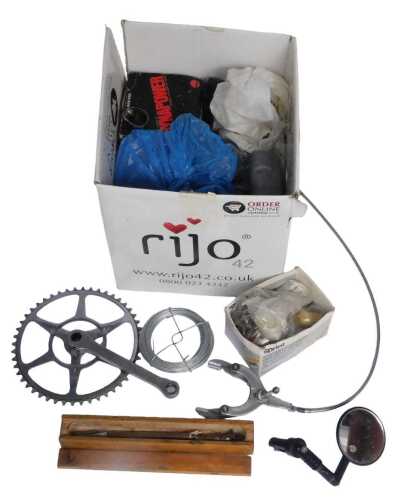 Various bicycle parts, including crank, various cables, puncture repair kit, various bells, etc....