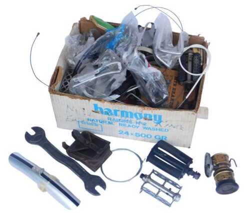 Various bicycle spares and tools, including pedals, cables, small mudguards, Campagnolo cables...