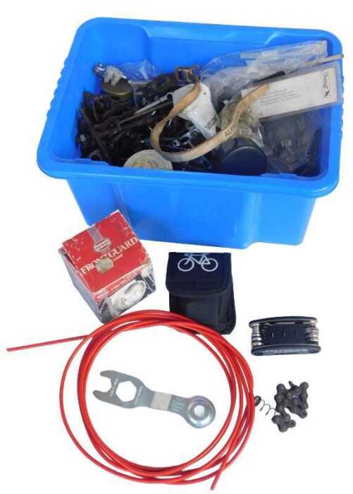 Various bicycle spares, including chains, Eveready front guard cycle lamp, cables, various bolts,...