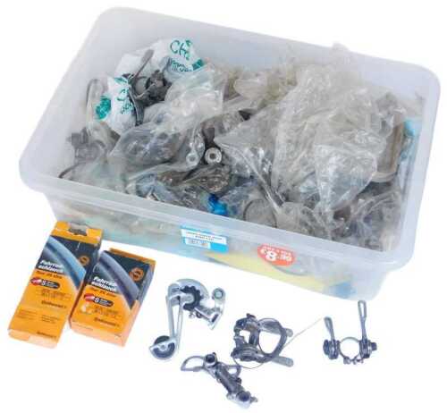 Various bicycle parts, including front derailleurs, rear derailleurs, Continental inner tubes,...
