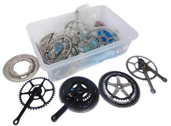 Bicycle spares, including crank sets, pedals, bottom brackets, etc. (1 box)