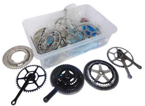 Bicycle spares, including crank sets, pedals, bottom brackets, etc. (1 box)