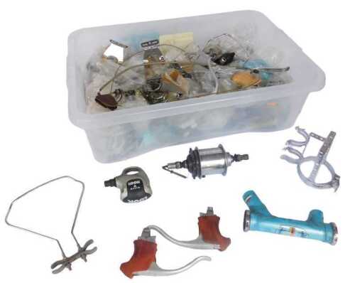 Look pedals, spokes, Campagnolo brake handles, free wheel sets, etc. (1 box)