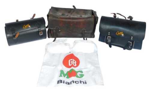 A brown leather pannier bag, and two Chossy pannier bags.