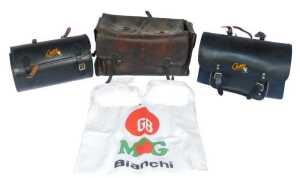 A brown leather pannier bag, and two Chossy pannier bags.