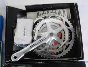 A Campagnolo Comp Triple crank set, a PMP crank set, and a Campagnolo Comp Triple tens crank set,... - 4