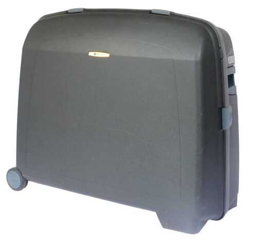 A Delsey hardshell suitcase, black.